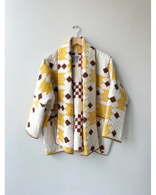 The Parenting 2025 Parker Posey Yellow & White Quilted Coat