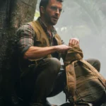 Jurassic World Rebirth Jonathan Bailey Brown Vest